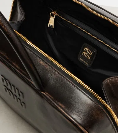 Miu Miu Black Bauletto Bag Zip Embossed Logo In Multi