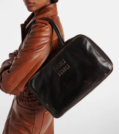 Miu Miu Black Bauletto Bag Zip Embossed Logo In Multi