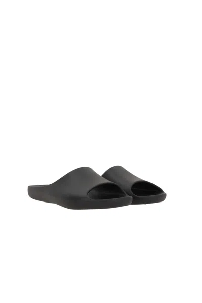 The Row Flat Open Toe Slides For Everyday Wear In Black