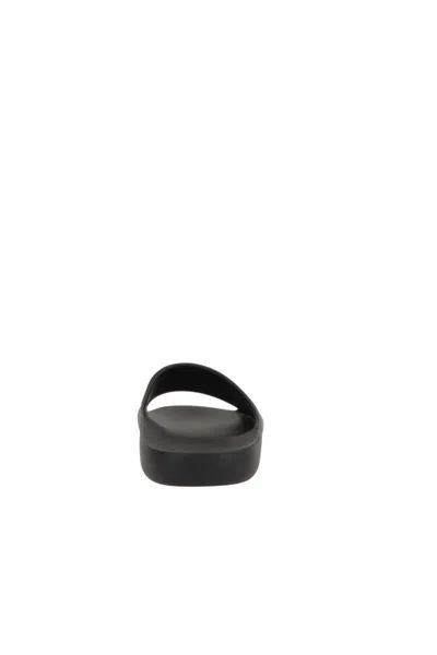 The Row Flat Open Toe Slides For Everyday Wear In Black