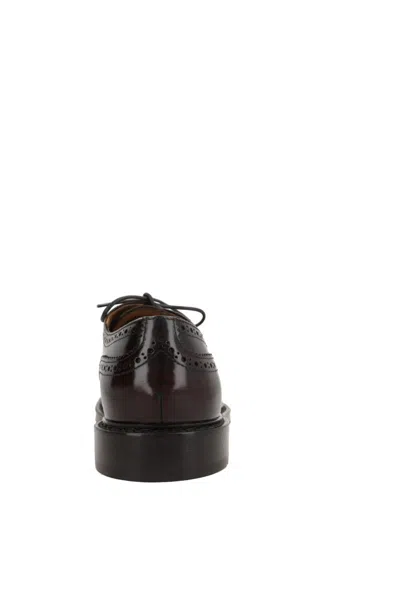 Doucal's Lace-up Shoes With Brogue Motif And Swallow Tail Detail In Black