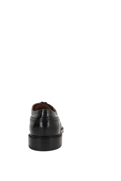 Doucal's Lace-up Shoes With Brogue Motif And Swallow Tail Detail In Black