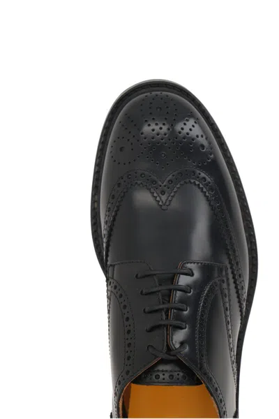 Doucal's Lace-up Shoes With Brogue Motif And Swallow Tail Detail In Black