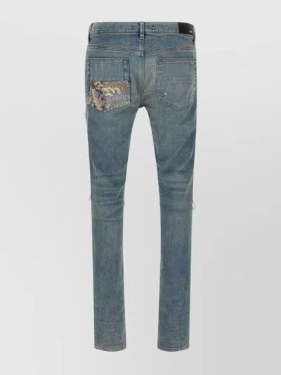 Amiri Distressed Five-pocket Denim Trousers In Blue