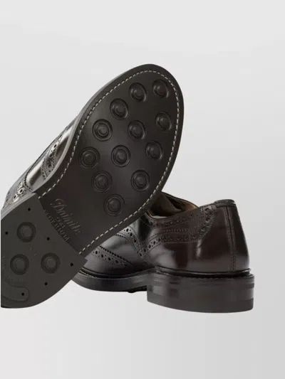 Tricker's Brogues With Round Toe And Brogue Detailing In Brown