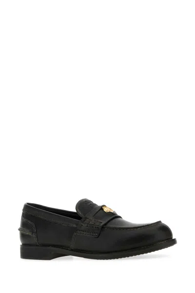 Miu Miu Round-toe Loafers In Black