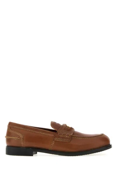 Miu Miu Round Toe Leather Loafers With Stitch Detail In Brown