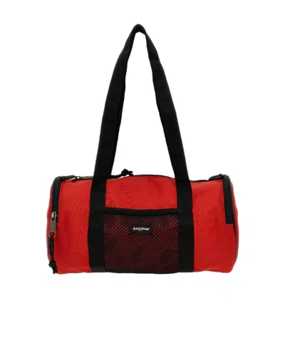 Eastpak X Telfar Medium Duffle Logo Patch Shoulder Bag In Red