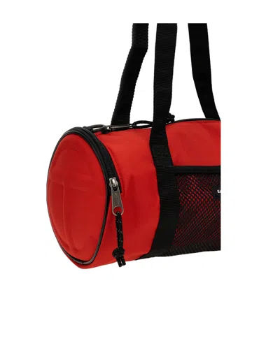 Eastpak X Telfar Medium Duffle Logo Patch Shoulder Bag In Red