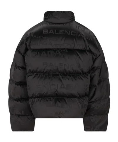 Balenciaga Men Nylon Down Jacket With All-over Lettering Logo In Black