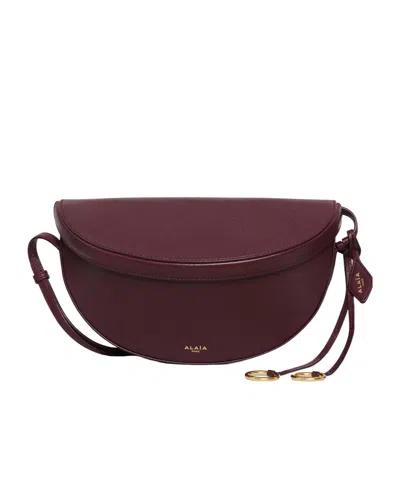 Alaïa East-west Goatskin Shoulder Bag In Burgundy