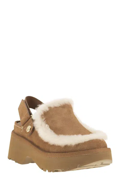 Ugg Suede Mules With Plush Trim And Adjustable Strap In Brown