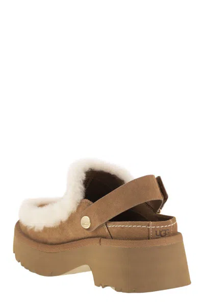 Ugg Suede Mules With Plush Trim And Adjustable Strap In Brown