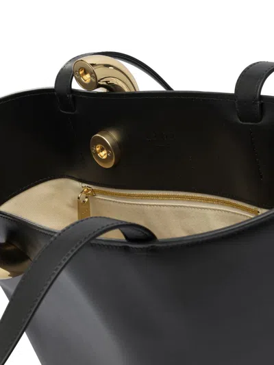 Jacquemus Le Petit Bambola Leather Top Handle Bag In Black