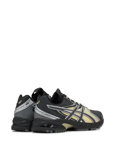 Asics Rounded Toe Sneakers With Grooved Sole And Sleek Finish In Gray