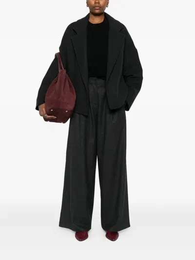 Dušan Elasticated Wool Trousers In Black