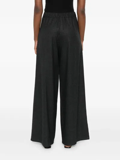 Dušan Elasticated Wool Trousers In Black