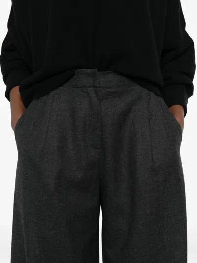 Dušan Elasticated Wool Trousers In Black