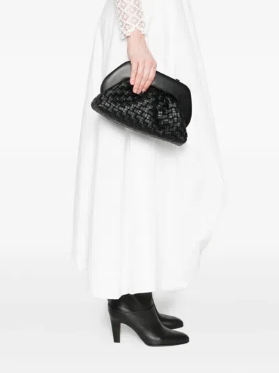 Themoirè Tia Black Clutch Bag With Woven Straw Motif And Shoulder Strap In Black