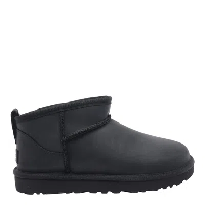 Ugg Classic Ultra Mini Black Ankle Boots With Shearling Lining In Leather Woman In Black