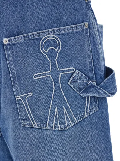 Jw Anderson Light Blue Jeans With Twisted Design And One Front Patch Pocket In Denim Man In Blue