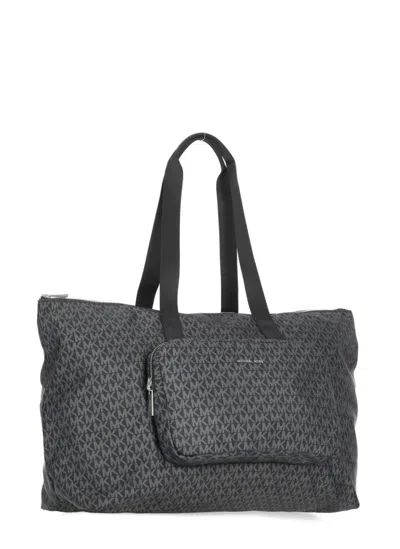 Michael Kors Tanner Large Printed Signature Logo Reversible Packable Tote Bag In Black