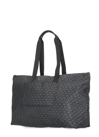 Michael Kors Tanner Large Printed Signature Logo Reversible Packable Tote Bag In Black