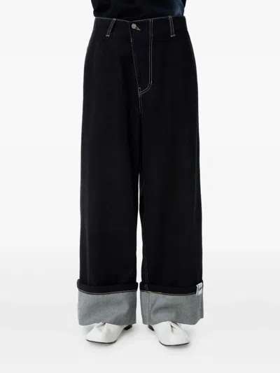 Ader Error Cuffed Jeans In Black