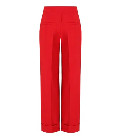 Essentiel Antwerp Pressed-crease Flared Trousers In Red