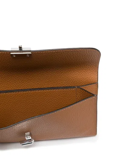 Totême Toteme T-lock Leather Continental Wallet In Brown