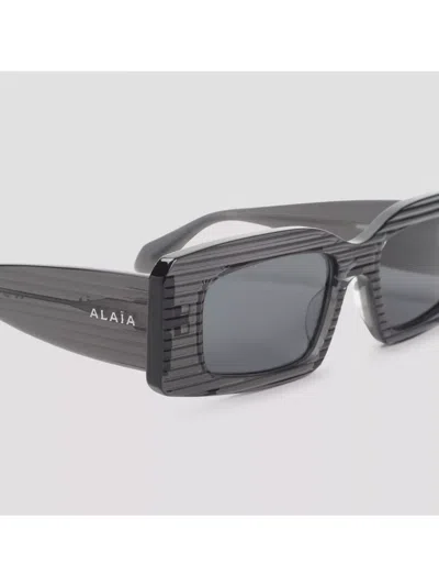 Alaïa Rectangular Frame Sunglasses Striped Pattern In Gray