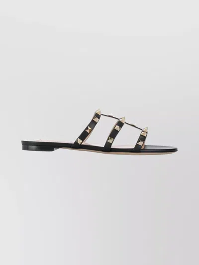 Valentino Rockstud Flat Sandals In Black