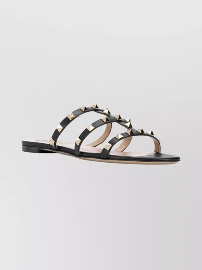 Valentino Rockstud Flat Sandals In Black