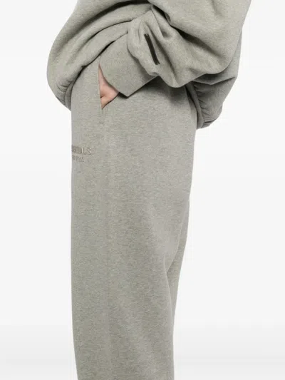 Essentials Logo-embossed Trousers In Gray
