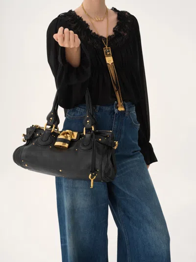 Chloé Structured Shoulder Bag With Padlock And Studs In Black