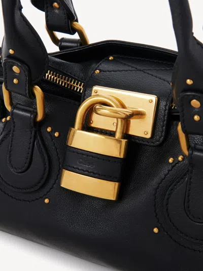 Chloé Structured Shoulder Bag With Padlock And Studs In Black
