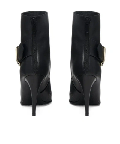 Alexander Mcqueen Calfskin Heron Buckle Heeled Boots 105 In Black