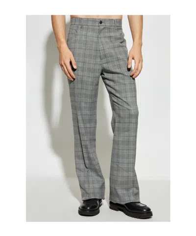 Amiri Checked Flared Trousers In Gray