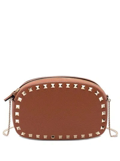 Valentino Studded Leather Crossbody Bag With Chain Strap In Brown