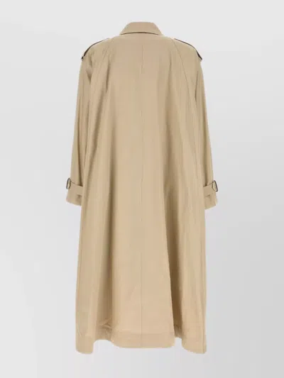 Saint Laurent Single-breasted Trench Coat Featuring Storm Flap In Neutral
