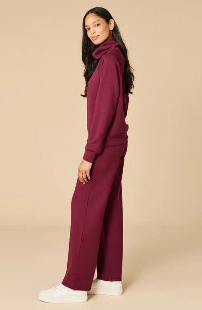 Softies Athleisure Mock Neck And Pleated Pant Set In Burgundy