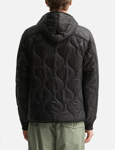 C.p. Company Black Jacket With Fixed Hood And Logo Plaque On The Sleeve In Tech Fabric Man In Black