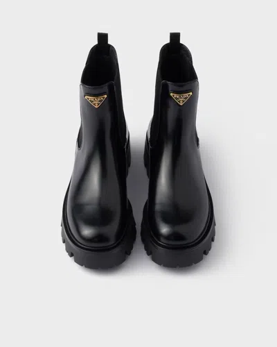 Prada 55mm Triangle-logo Chelsea Boots In Black