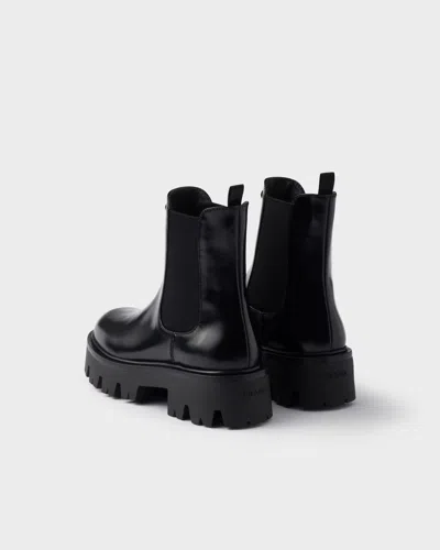 Prada 55mm Triangle-logo Chelsea Boots In Black