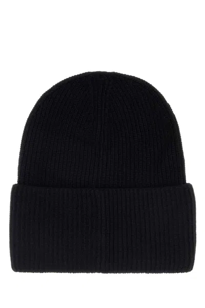 Moncler Ribbed Knit Carded Wool Beanie With Felt Logo Patch In Black