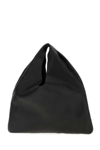 The Row Handbags. In Black