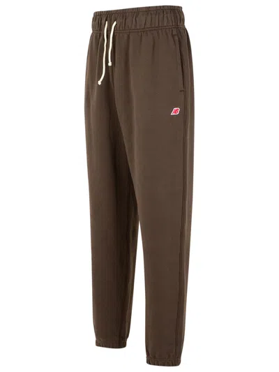 New Balance Elastic-waistband Logo-patch Track Pants In Brown
