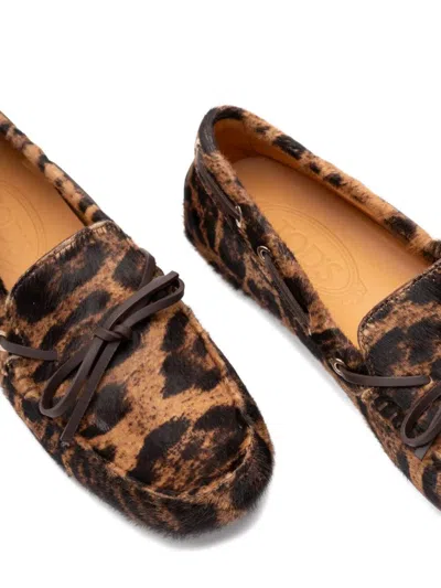 Tod's Leopard Print Leather Slip-on Loafers With Signature Rubber Outsole In Brown