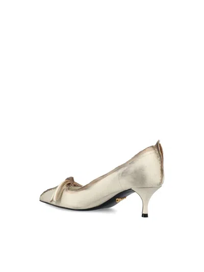 Prada Exposed Seam Kitten Heel Pump In Neutral