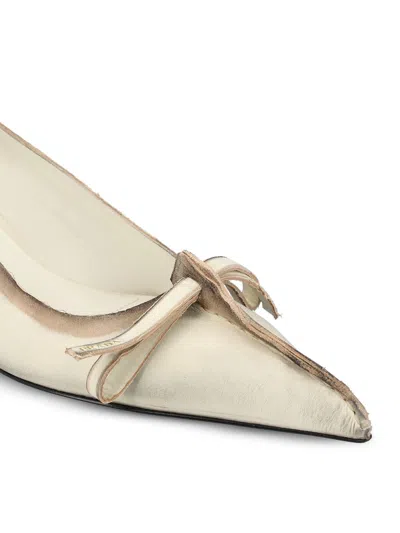 Prada Exposed Seam Kitten Heel Pump In Neutral
